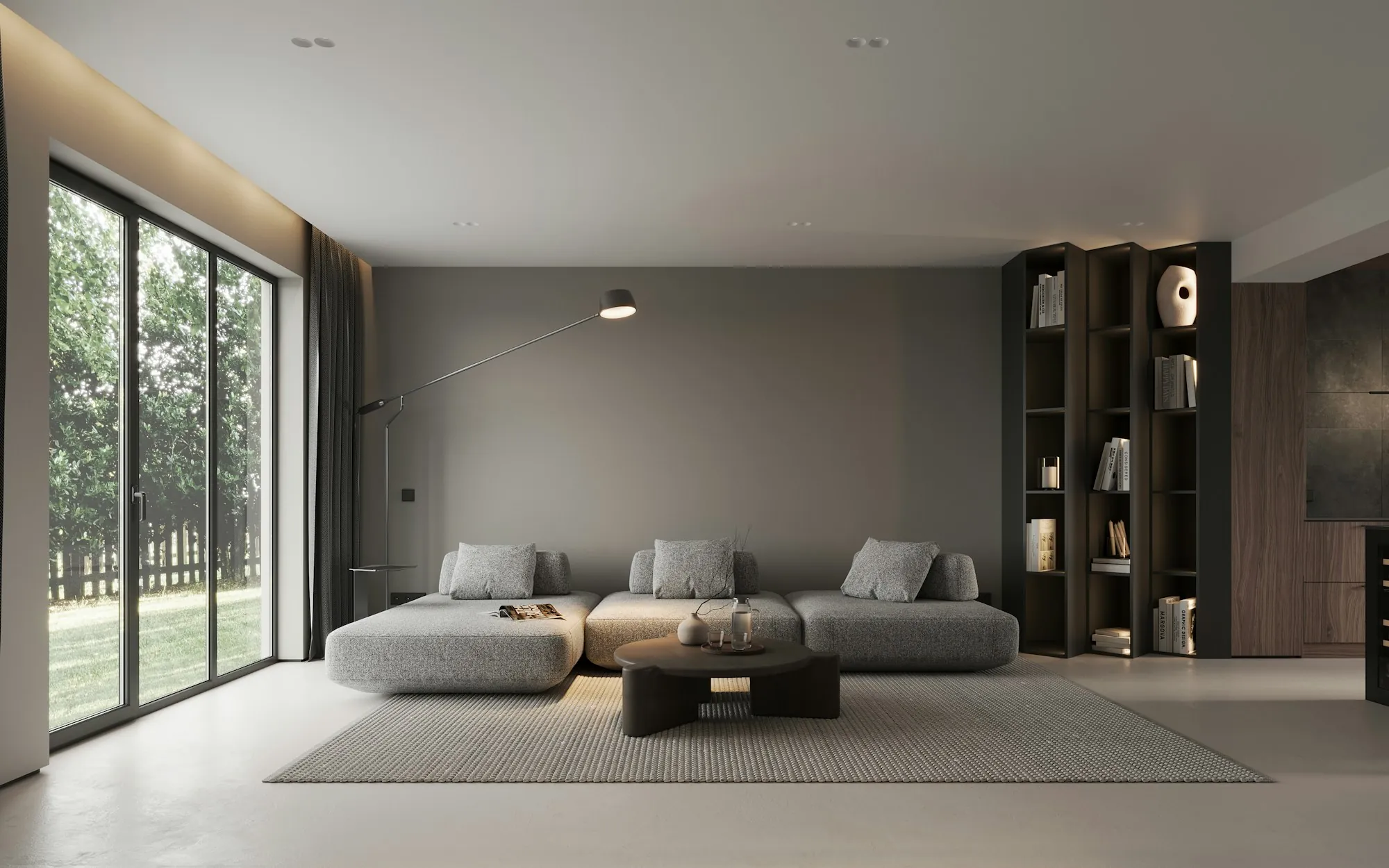 Open, modern living room with floor-to-ceiling sliding doors and built-in shelving